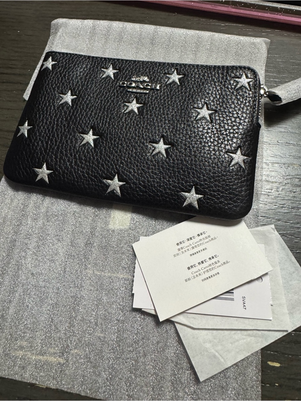 Coach women’s Black Leather Star Zip Pouch